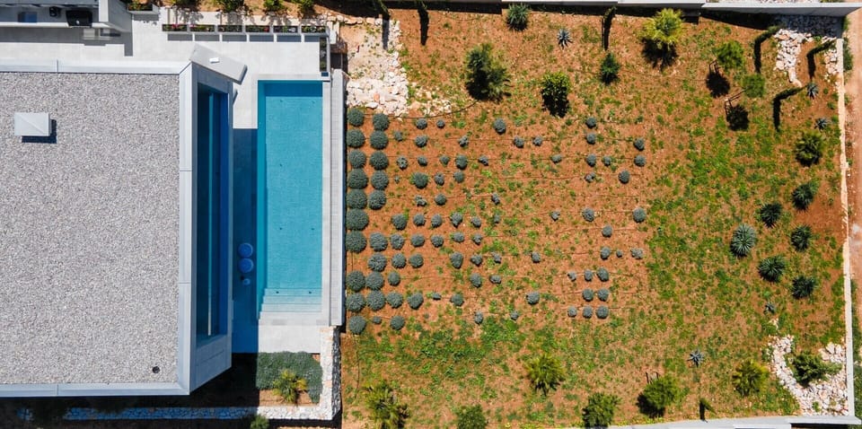 Aerial view of Croatia luxury family villa with private pool and garden for vacation and rent on Hvar island