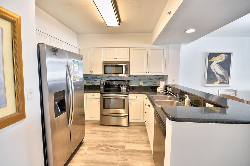 Condo, 3 Bedrooms | Private kitchen | Fridge, oven, stovetop, coffee/tea maker