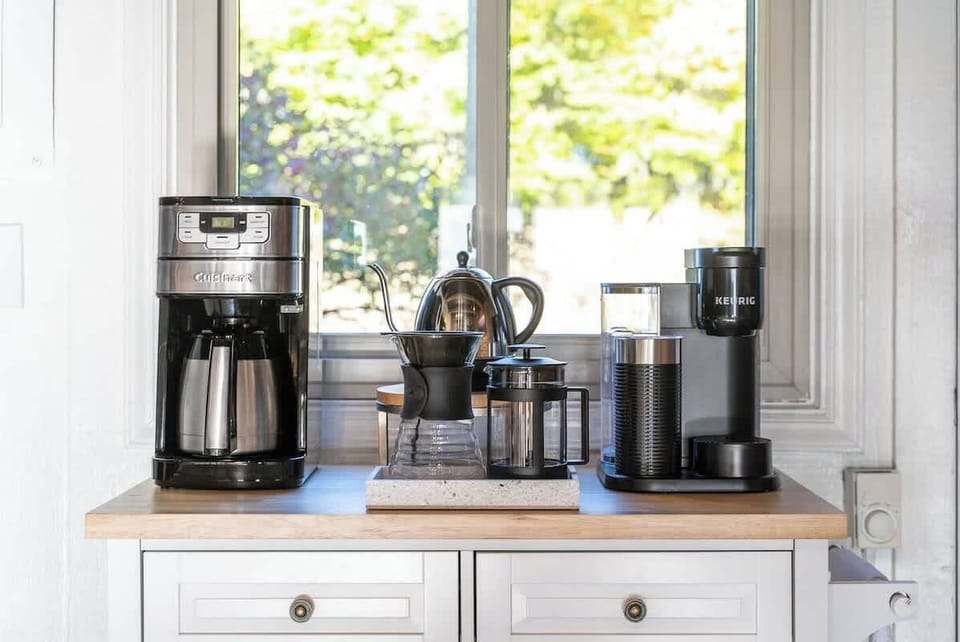 Complete coffee bar with multiple brewing methods and grinder. Free coffee provided!