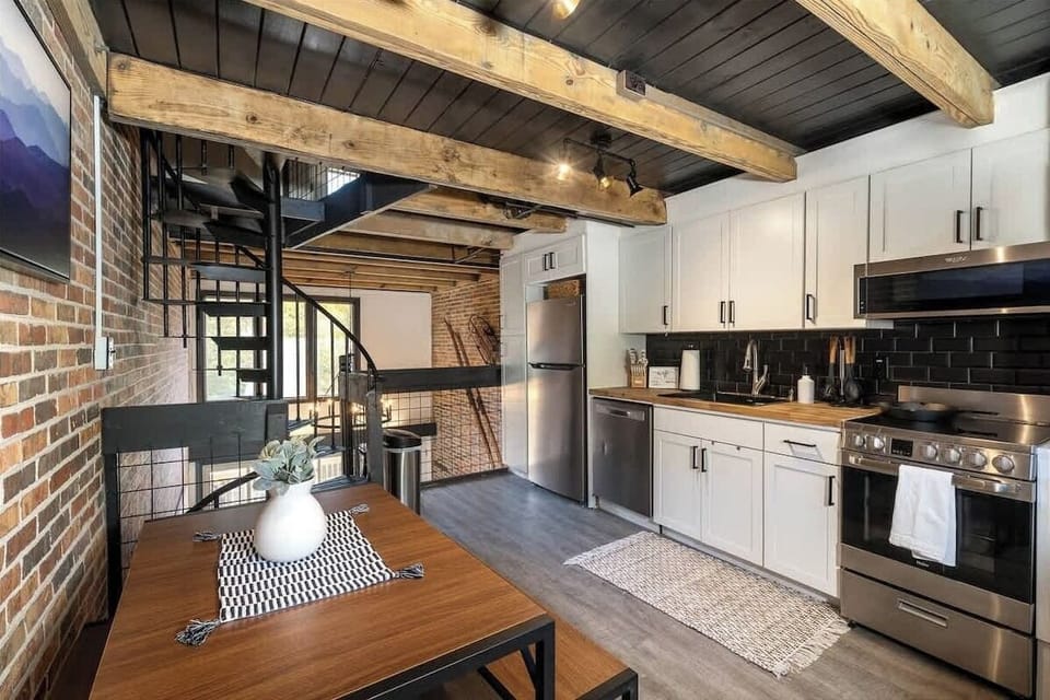 Beautiful kitchen & dining area overlooking the first floor living room.