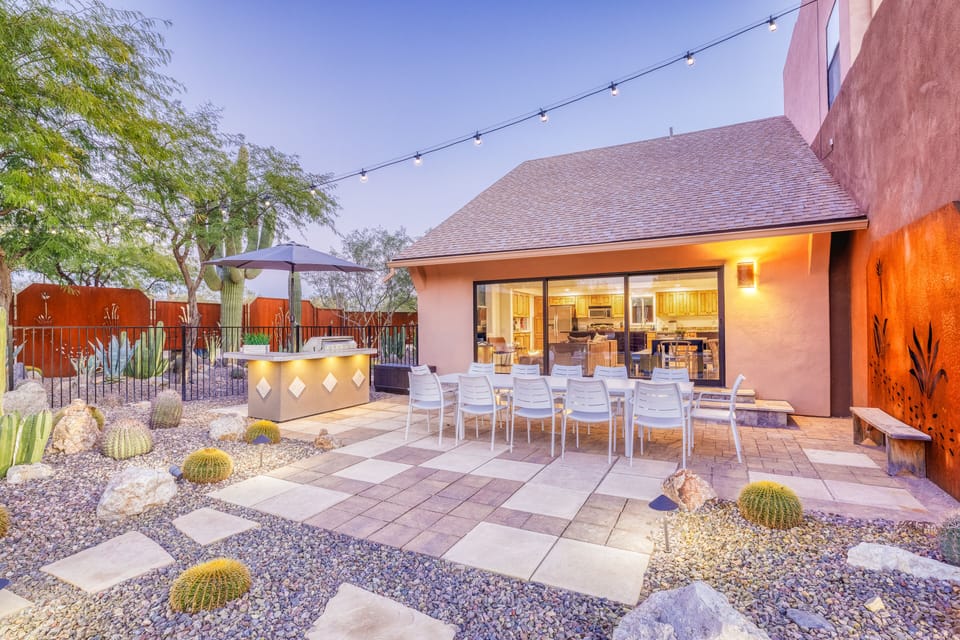 Outdoor dining area with huge dining table.