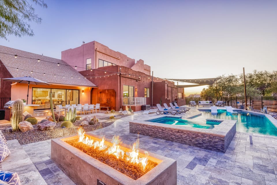 Enjoy cozy nights by the large outdoor fire pit or relax in the large hot tub!