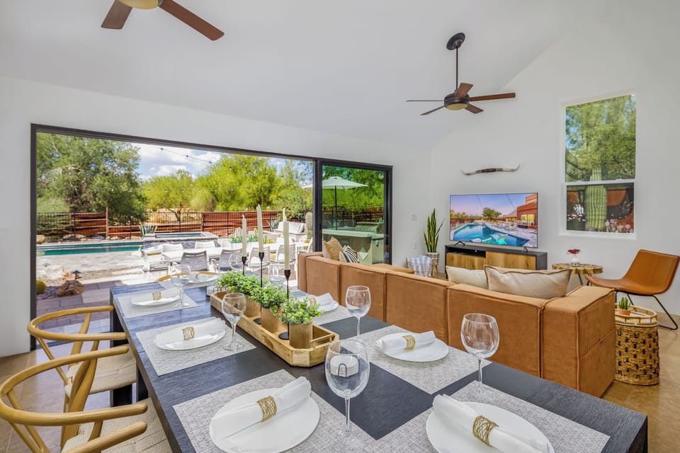 The great room features large sliding glass door the opens to the relaxing yard.