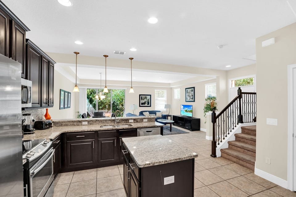 Oversized island offers tons of prep space for family meals.