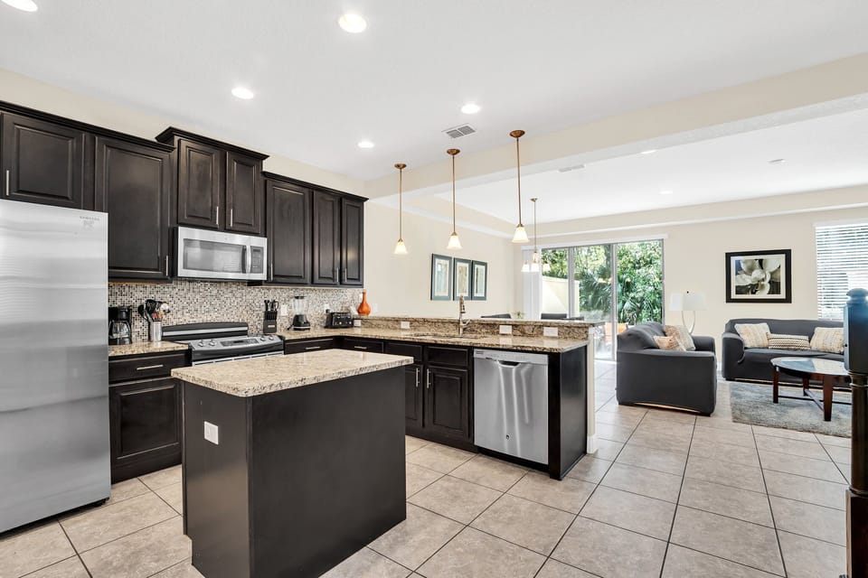 Centrally located kitchen makes cooking and gathering easy.
