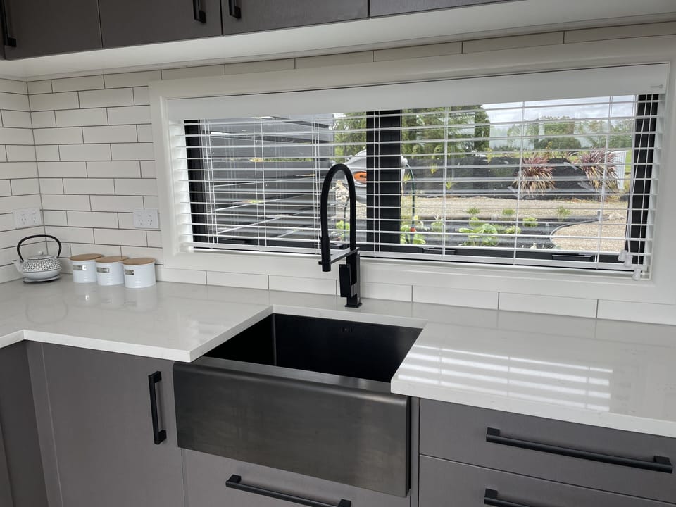 Sleek clean kitchen with heaps of preparation area
