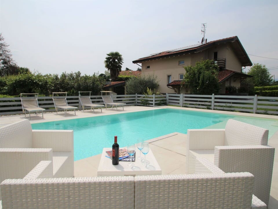 Water, Sky, Property, Plant, Swimming Pool, Building, Tree, Architecture, Outdoor Furniture, Leisure