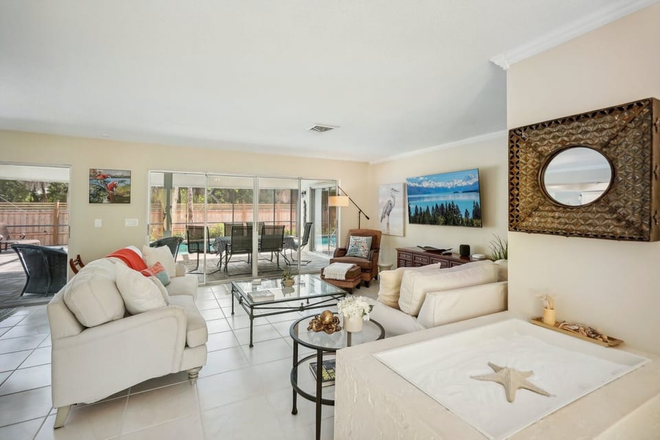 Living area has full view of pool area.