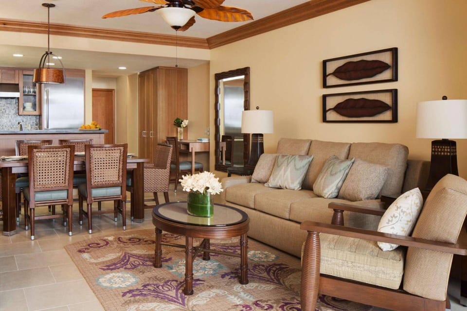 All units have a separate dining area with a large table, in addition to bar stools at the kitchen counter.