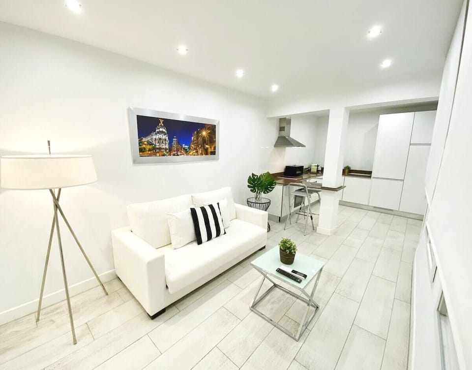 Views of the living room and part of the kitchen
