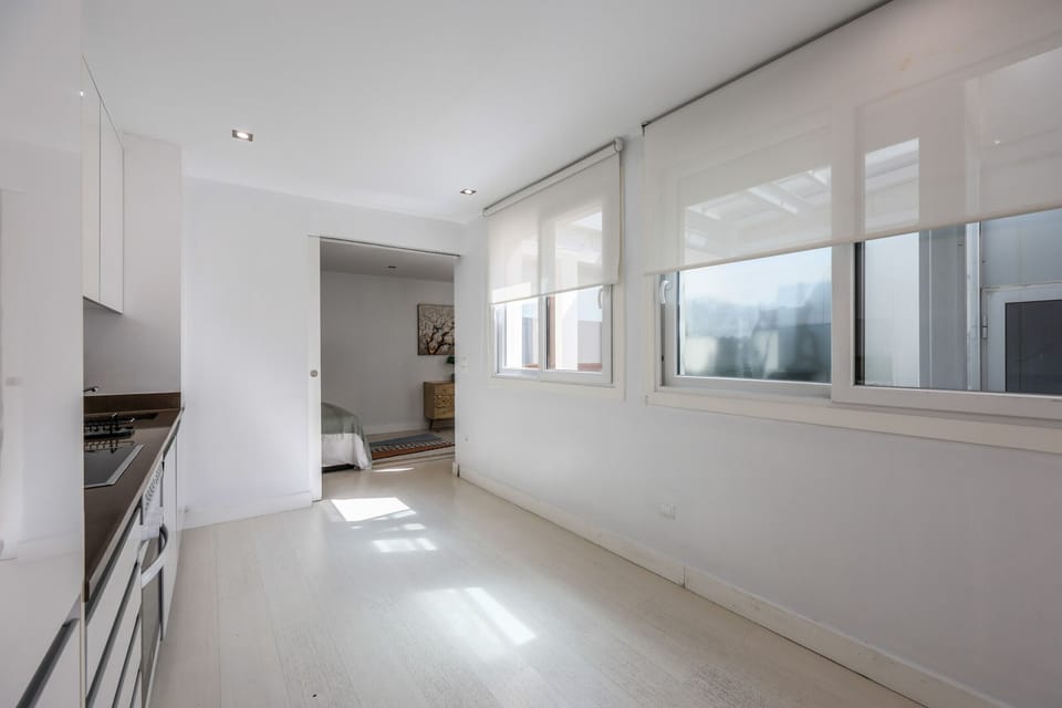 View of the kitchen area with appliances