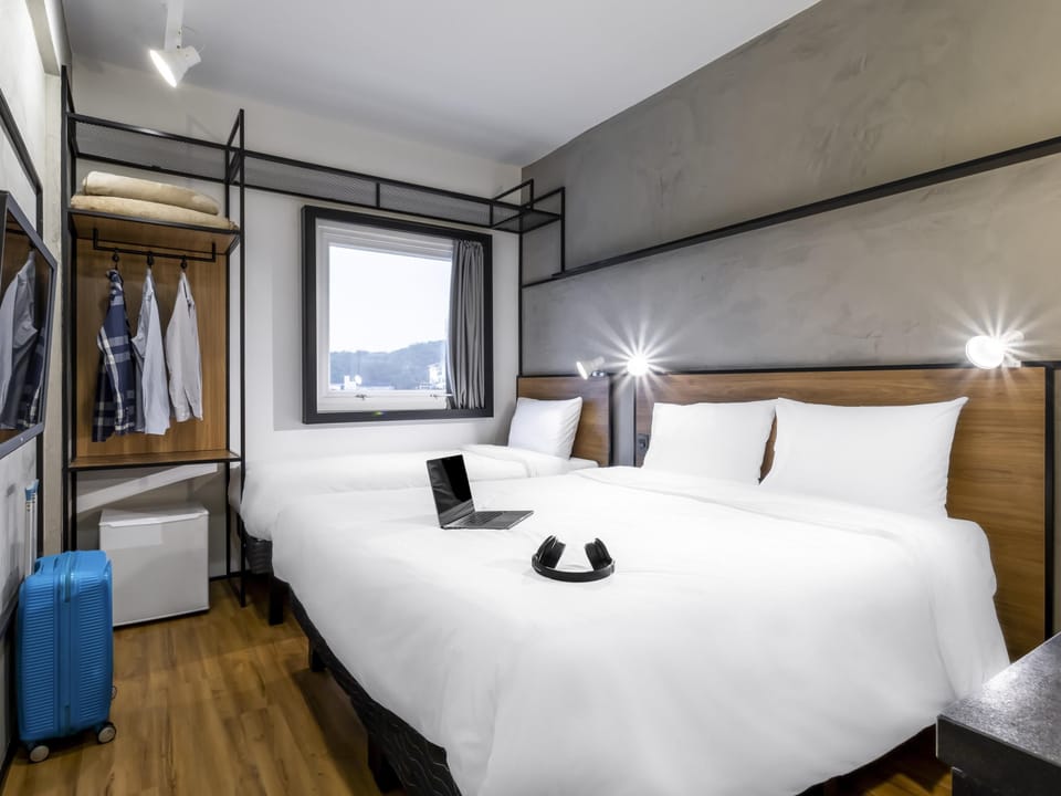 Standard Room, Multiple Beds | In-room safe, soundproofing, iron/ironing board, free WiFi