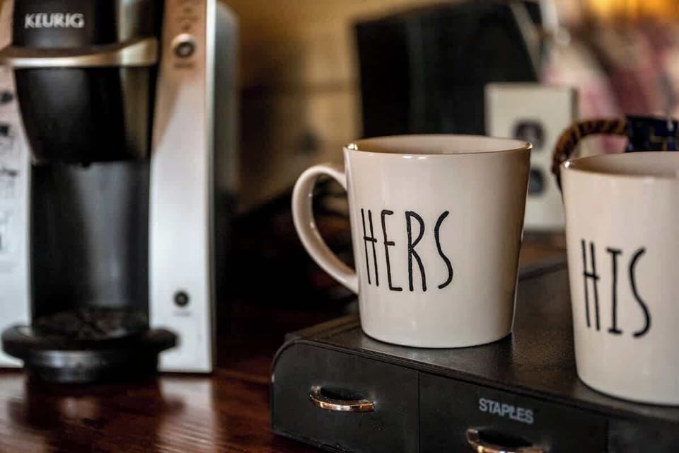 Rise and shine with a freshly brewed cup of coffee in our mountain cabin ️ Our in-room coffee maker makes it easy to start your day off right  Enjoy the peace and quiet of the mountains or relax on the porch while enjoying your favorite cup.