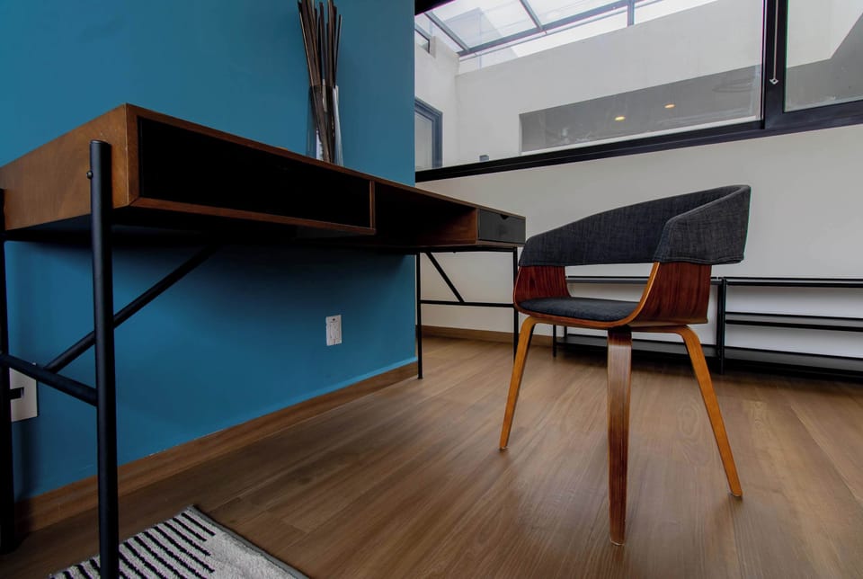 Work comfortably with a dedicated desk and chair.


