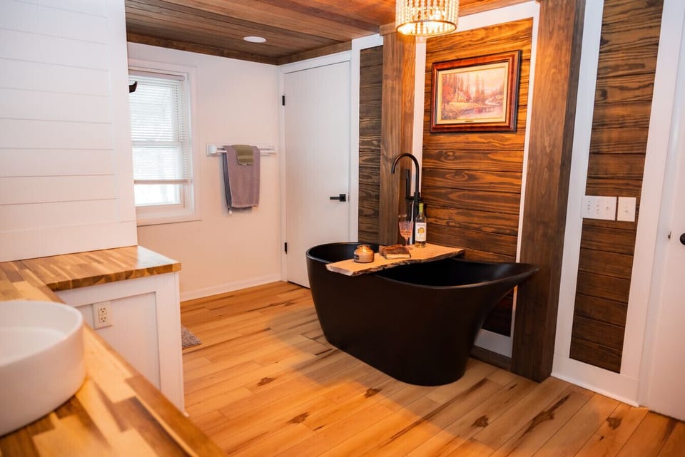 Your spa moment starts here- pour a glass, dim the lights, and melt into total relaxation in this deep tub.