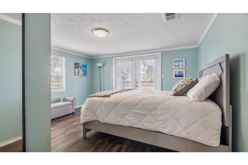This is the bedroom in the back of the house. There is a double closet. 