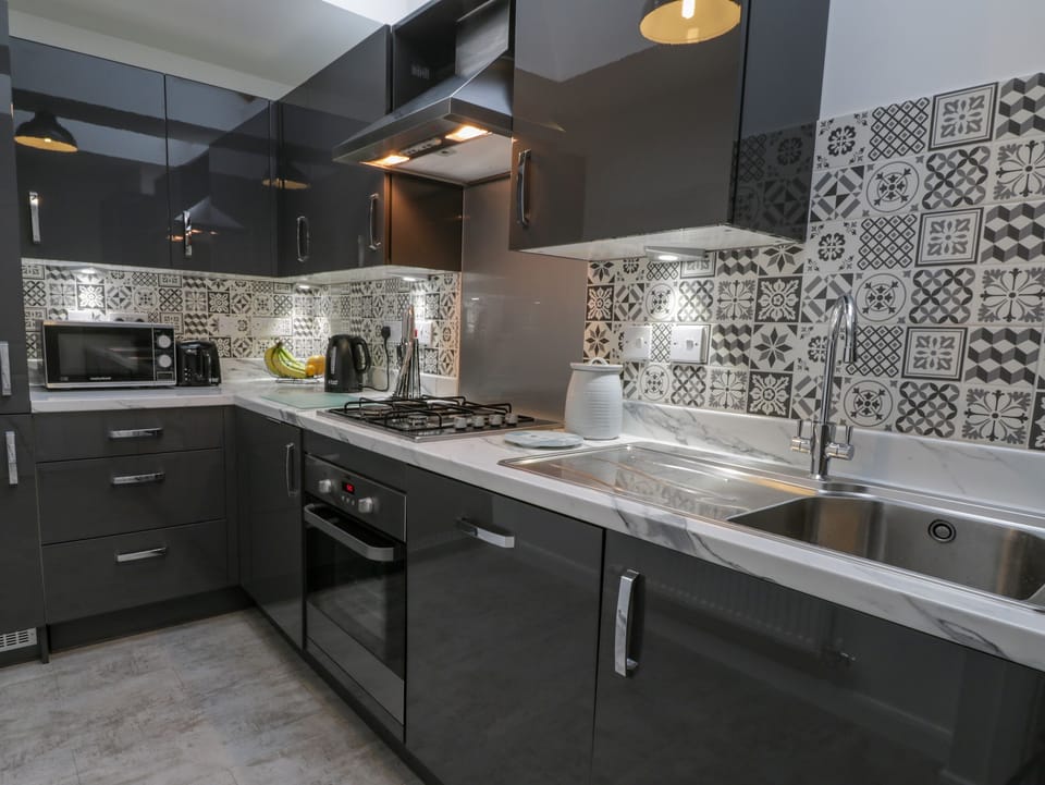 Fridge, dishwasher, electric kettle, toaster