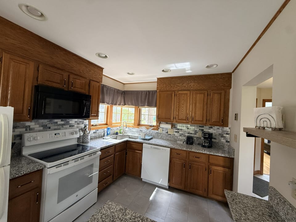 Full Kitchen.  Drip Coffee, electric stove, all basic needs provided.  