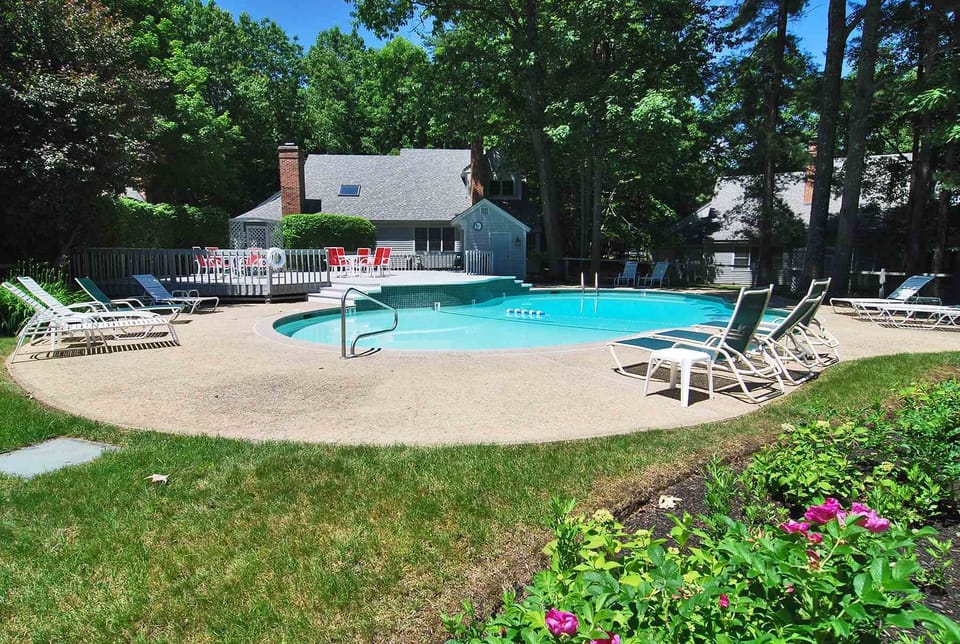 Access to outdoor pool.  Seating and tables.  Seasonal