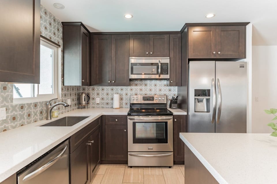 Fully stocked kitchen with all the appliances you need to cook delicious meals