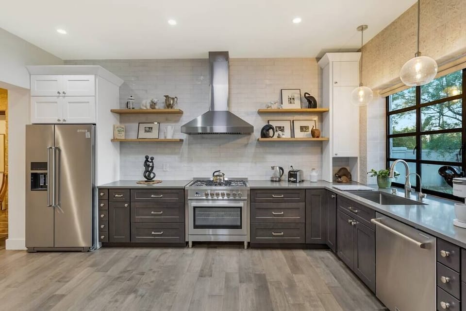 New state of the art, fully equiped kitchen includes RO drinking water at sink, dishwasher, gas range,  full size refrigerator/freezer, corner dining booth