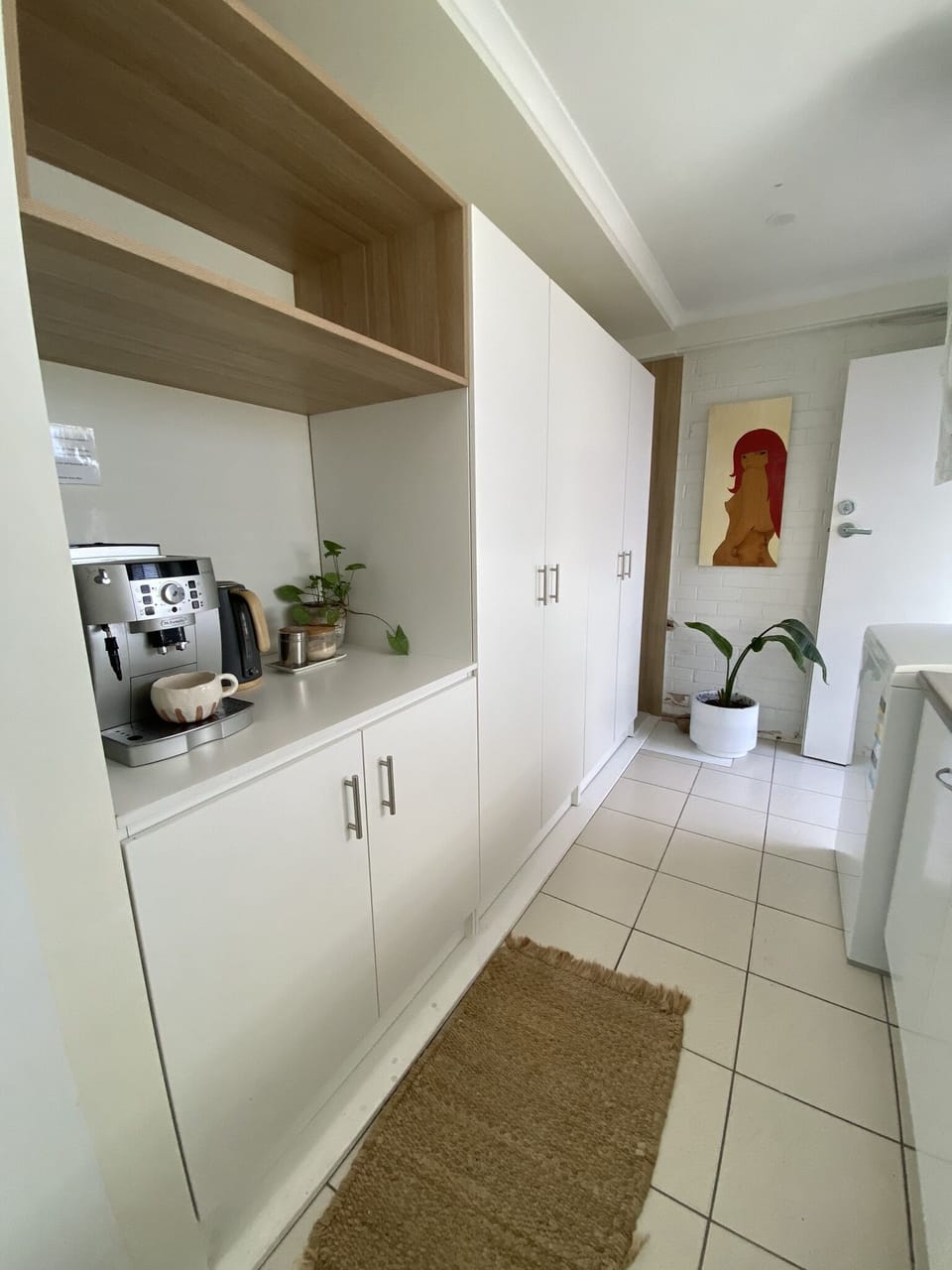 Laundry is adjacent to kitchen and has 8kg washer and dryer for you to use 