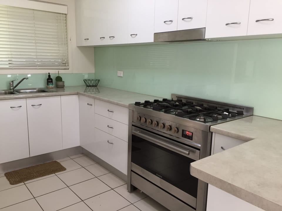 new SMEG 900mm gas cook top and electric oven with plenty of bench and storage