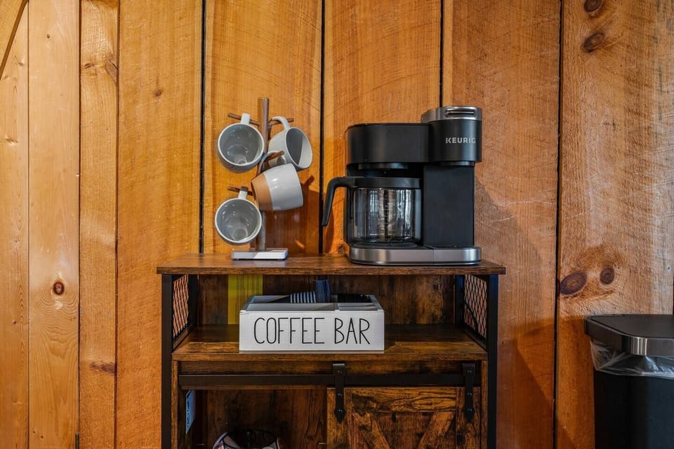 Brew single-serve or brew a pot — the coffee station does both, stocked and ready.