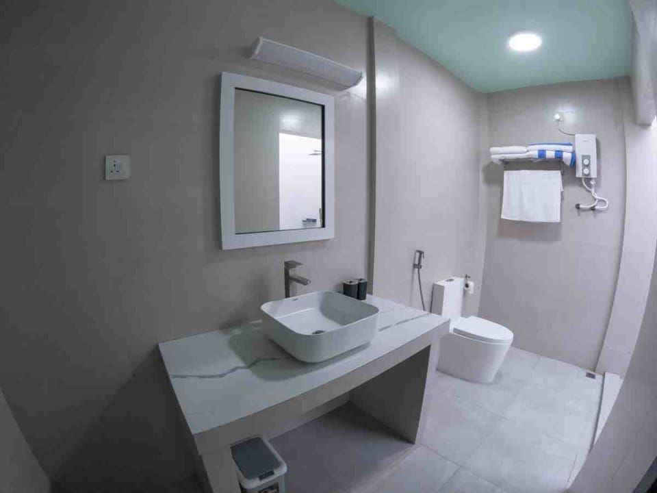 Family Double or Twin Room | Bathroom | Shower, rainfall showerhead, towels, soap