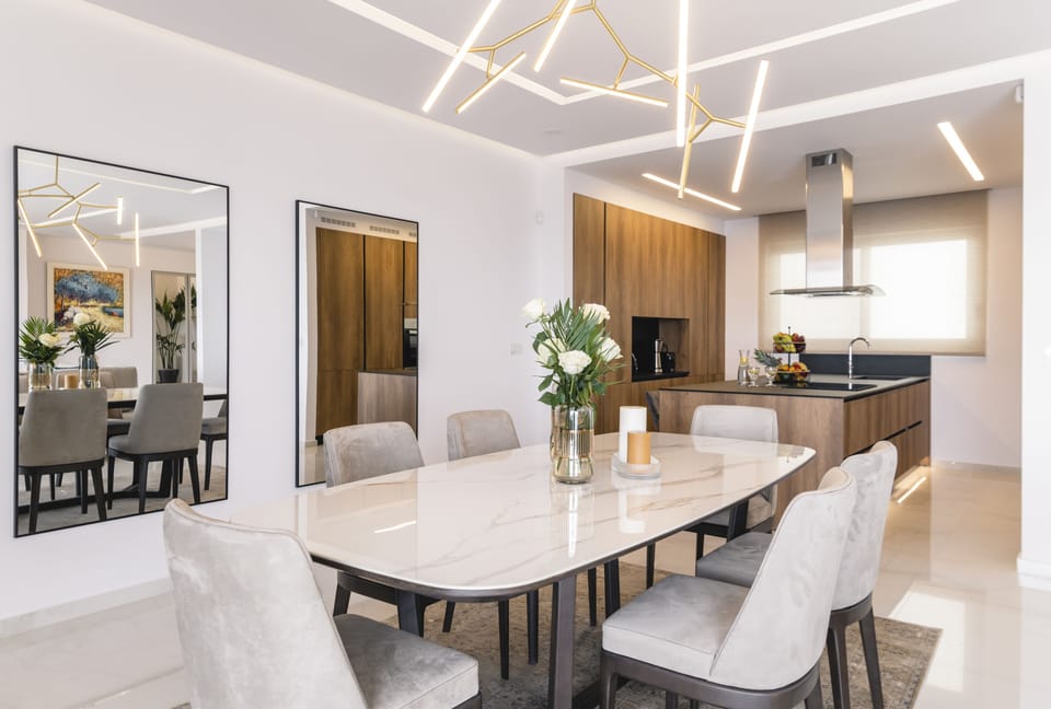 The open plan kitchen-dining area.
