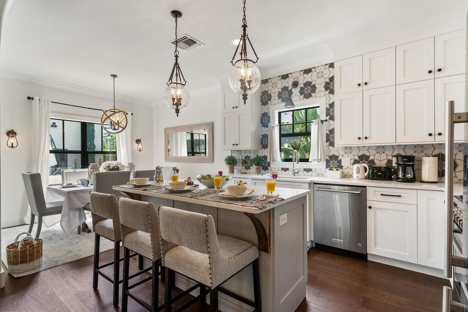  Fully equipped kitchen with top-of-the-line appliances and features. 