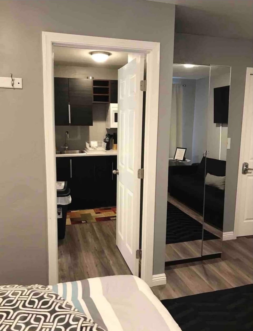 Includes a Kitchenette with coffee maker, microwave, mini fridge, coffee, tea, creamer, dishes, cups and silverware.