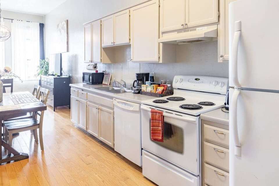 Full Kitchen includes all pots, pans, silverware, coffee maker, coffee, sugar, creamer, tea, blender, toaster, refrigerator, microwave, glasses, wine glasses and cooking/eating utensils