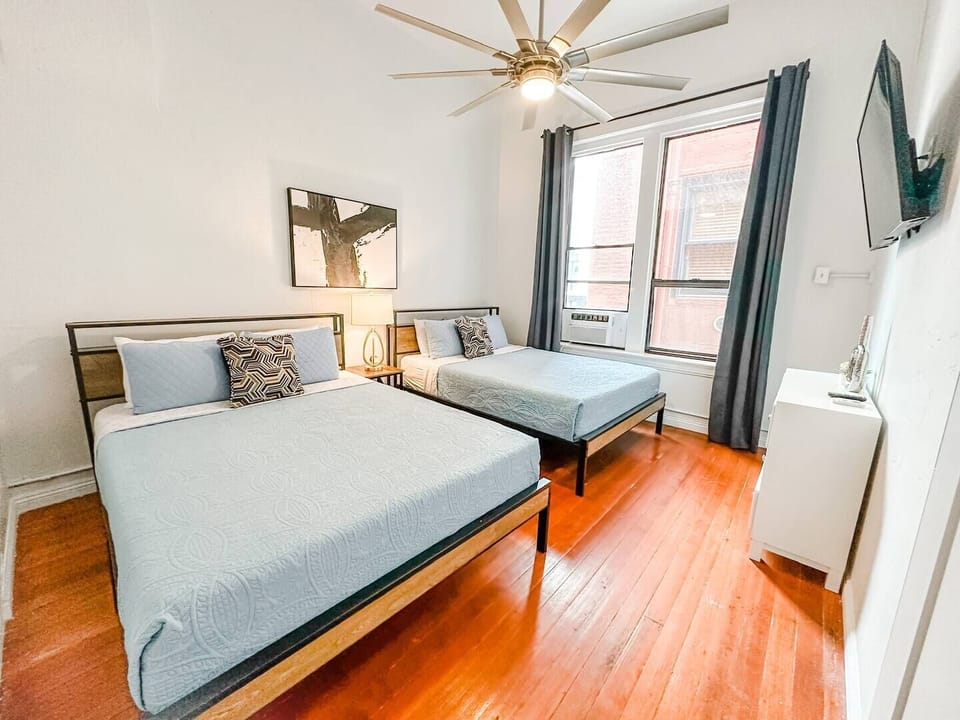 BEDROOM No. 1: Includes (2) Queen beds with all pillows, linens and blankets as well as a 50 inch ROKU Smart TV