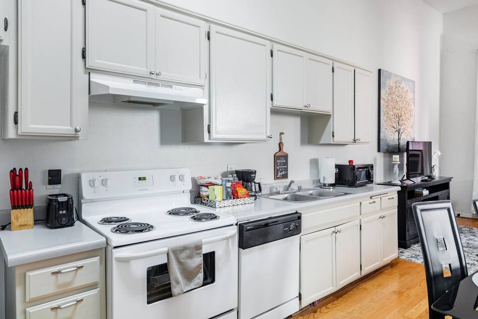 Full Kitchen includes all pots, pans, silverware, coffee maker, coffee, sugar, creamer, tea, blender, toaster, refrigerator, microwave, glasses, wine glasses and cooking/eating utensils