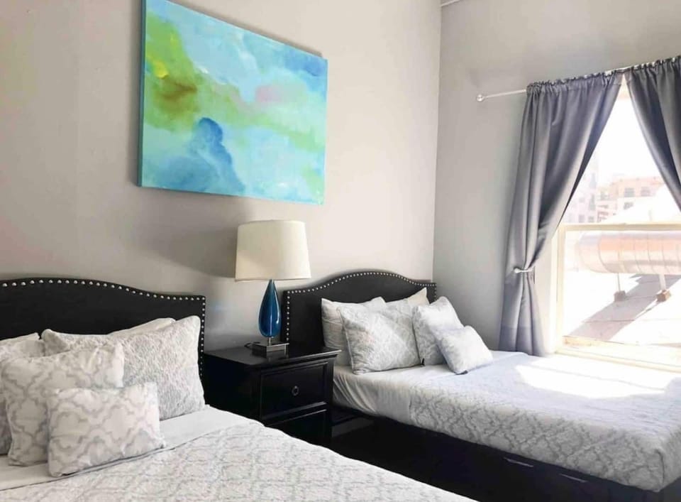 Bedroom No. 2: There are (2) Double beds with all pillows, linens and blankets