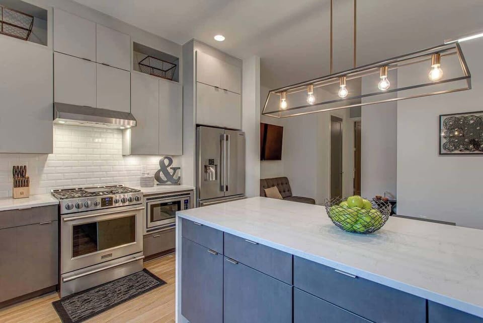 Cook, entertain, and create in a modern kitchen flooded with natural light.