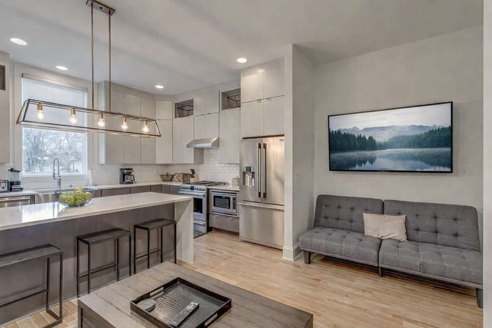 Open-concept kitchen and living area designed for gathering, entertaining, and relaxing together.