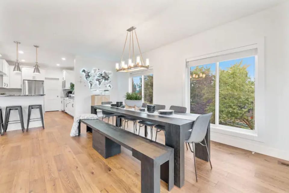 Eat together at the large dining table set for 16 