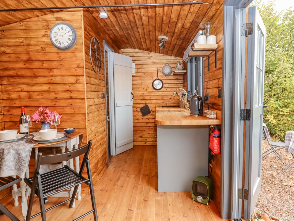 Fridge, electric kettle, cookware/dishes/utensils