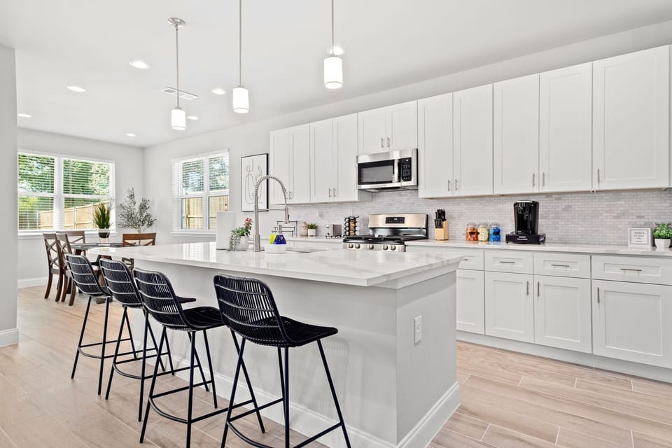 Cook up a big breakfast & serve it on the oversized kitchen island that seats 4!