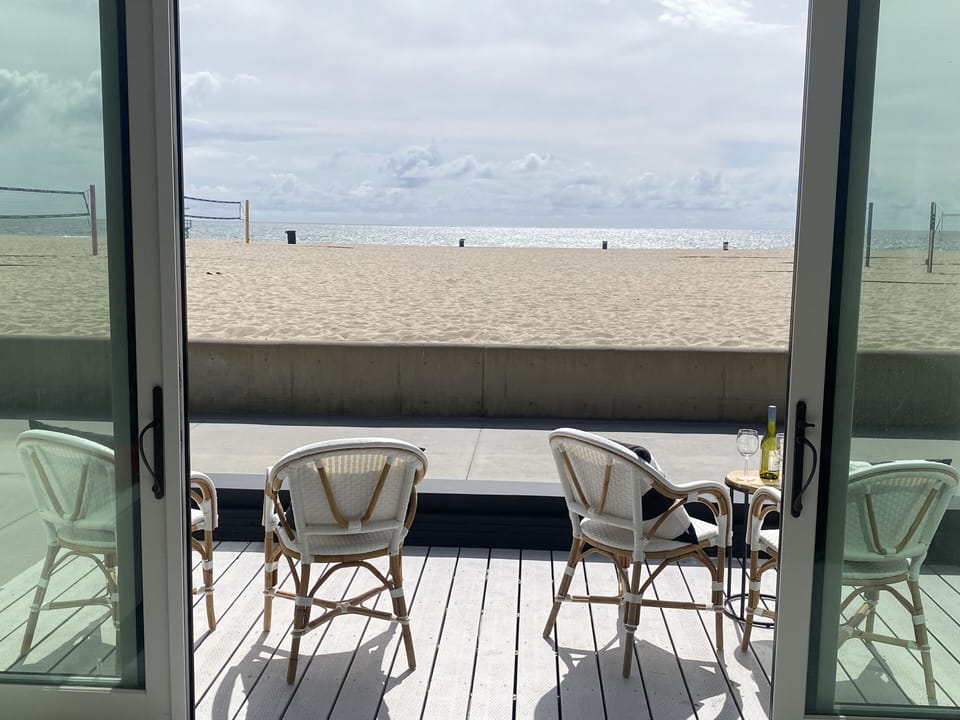 Ocean views! Beachfront deck. Open-flow from beach to living room and kitchen.