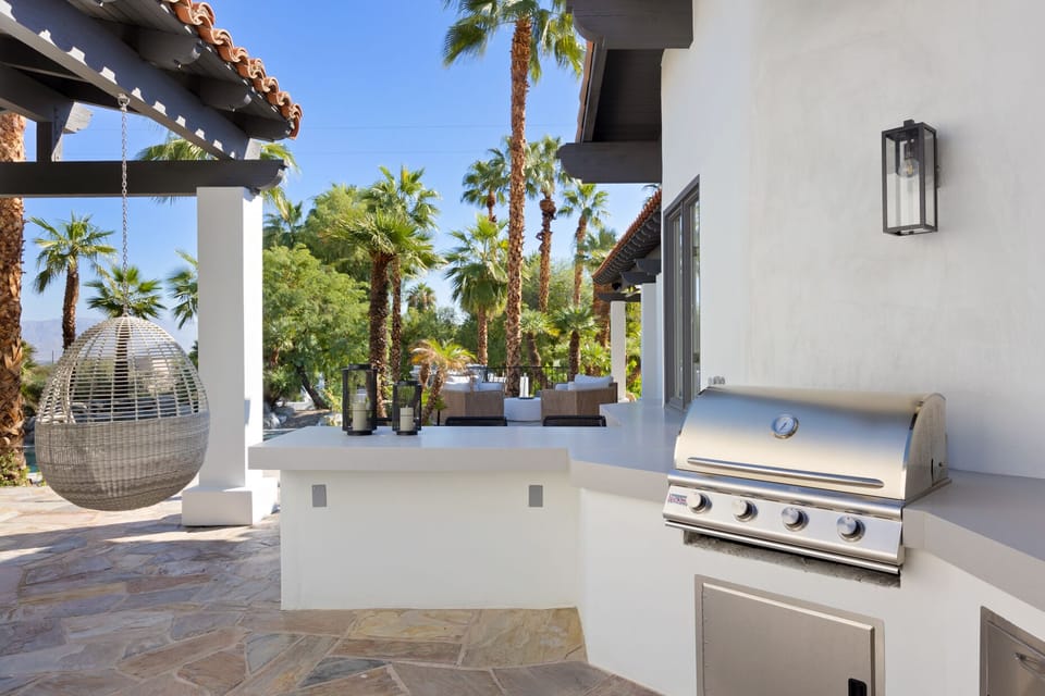 An outdoor kitchen with a gas barbecue great for whipping up your favorite meals