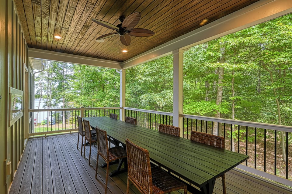 Main level screened-in porch w/ 2 dining tables. SONOS audio zone.