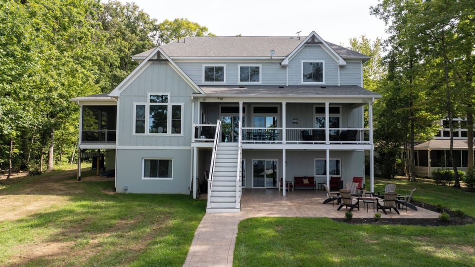 Sweeping lake views from every floor in those house. Huge patio w/ firepit.