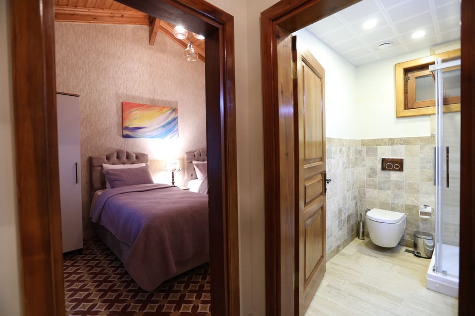 Family Room, Non Smoking, Garden View | Bathroom | Shower, rainfall showerhead, hair dryer, towels