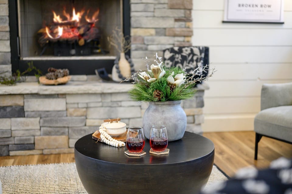 Living Room Retreat: Gather around the fire, sip cocktails, and soak in the rustic charm!