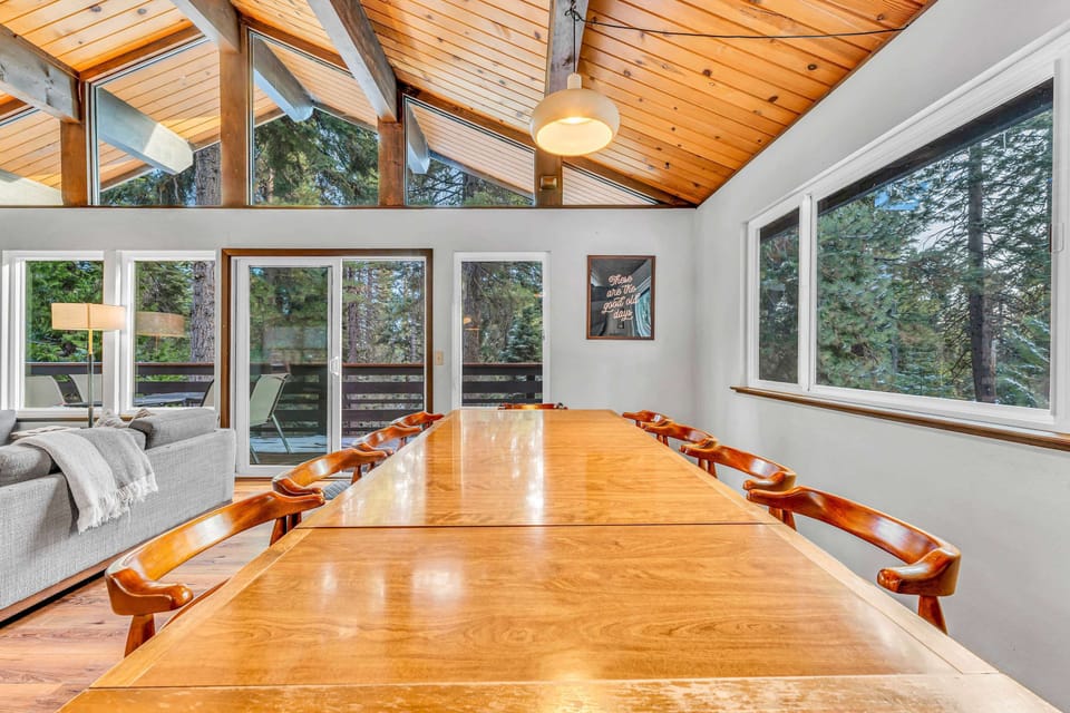 Dining Room: 10-person dining table, open layout with kitchen and living room
