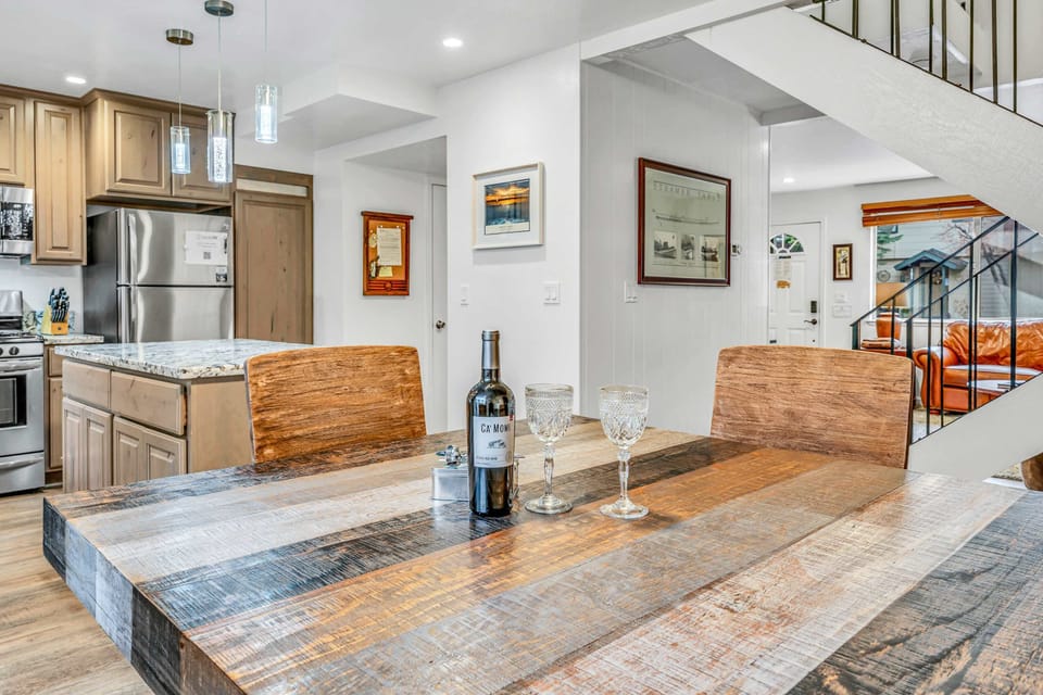 Dining area sits right off the kitchen, making it easy to serve meals and stay connected with the group.