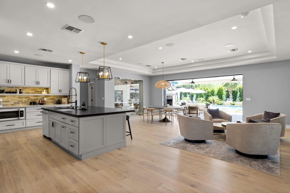 Open layout living room and dining, perfect for indoor/outdoor living